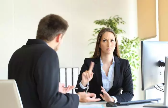 An interviewer saying no to a candidate for a job