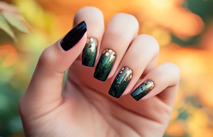 Black nails with metallic accents