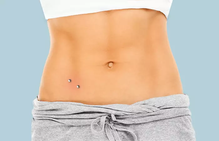 Close-up-image-of-a-woman-with-microdermal-hip-piercings-on-both-sides