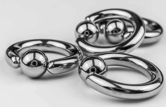  Close-up of a group of large gauge piercing rings made of surgical stainless steel