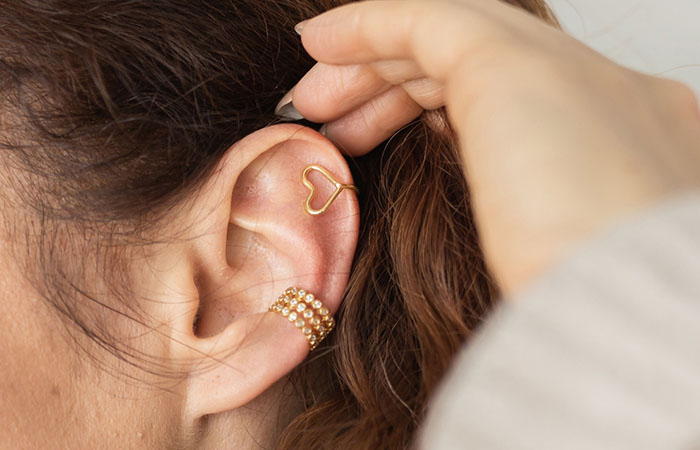 A woman wearing an ear cuff