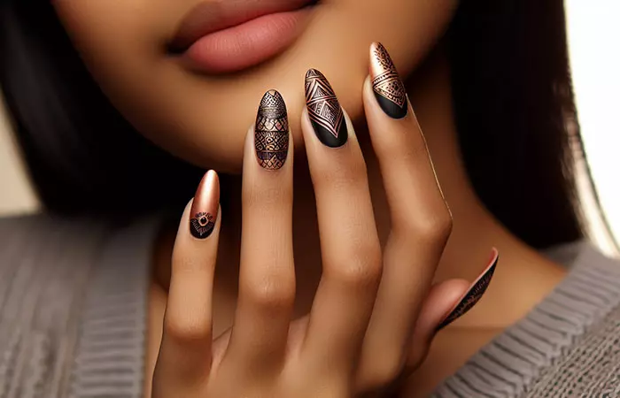 Rose gold and black nail design