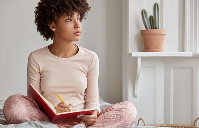 Woman journaling her thoughts