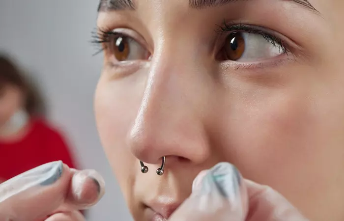 Woman with a septum piercing