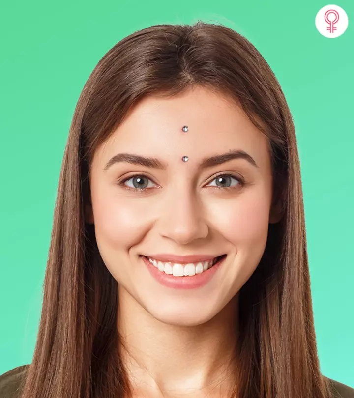 Woman with a third eye piercing