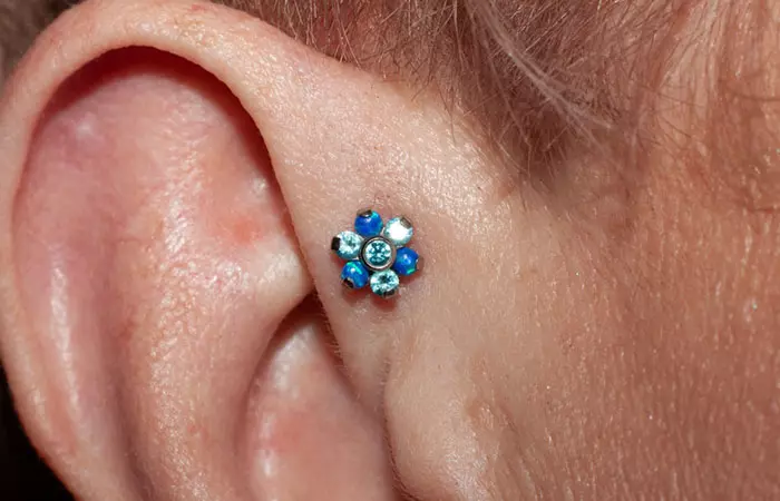 woman with forward helix piercing