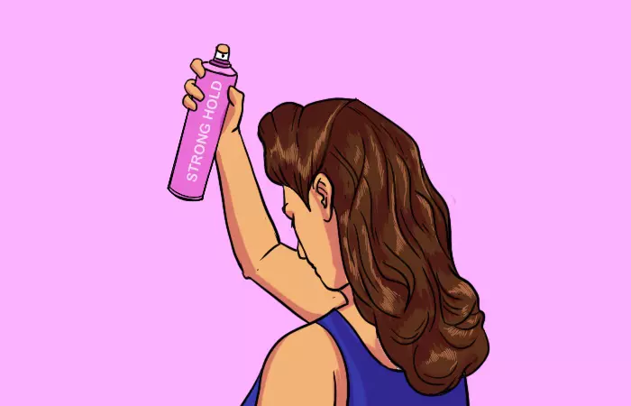 A woman adding a coat of hairspray to her victory rolls