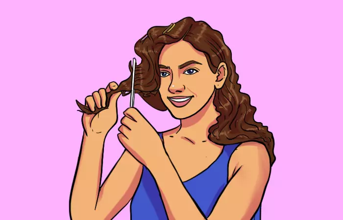 A woman backcombing her hair to create volume