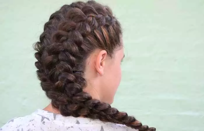 A woman with Dutch braids hairstyle