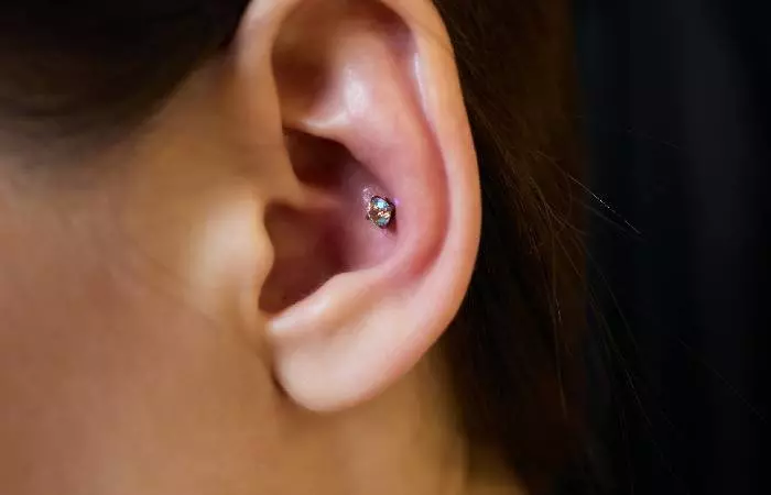 A woman with a conch piercing