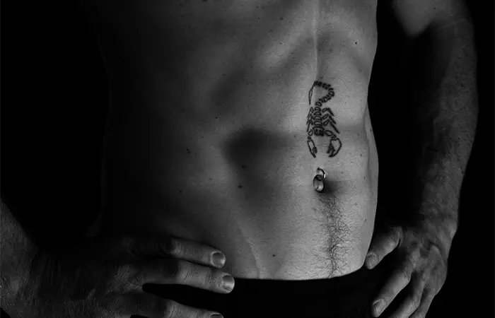 Man with a navel ring