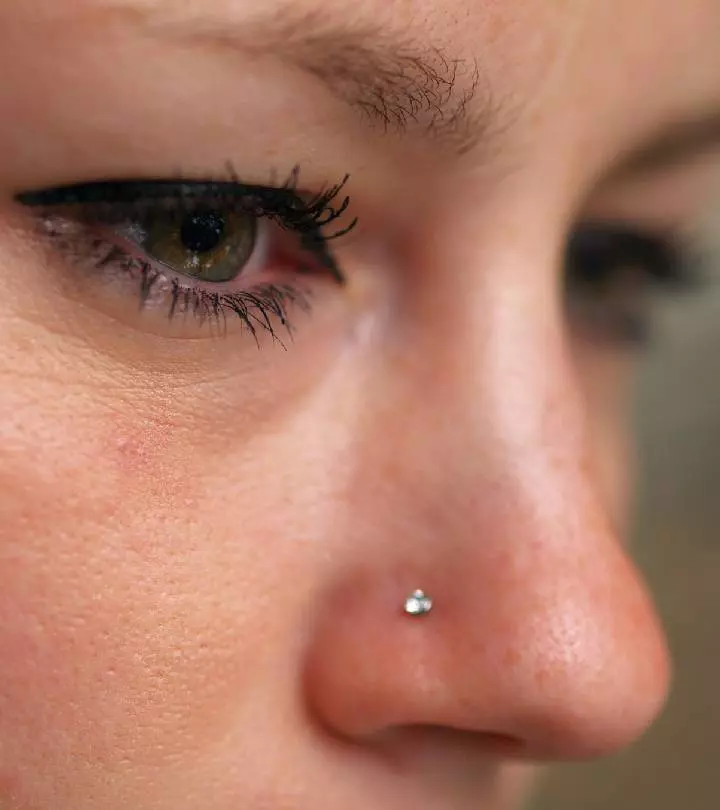 Girl with a crystal stud nose piercing