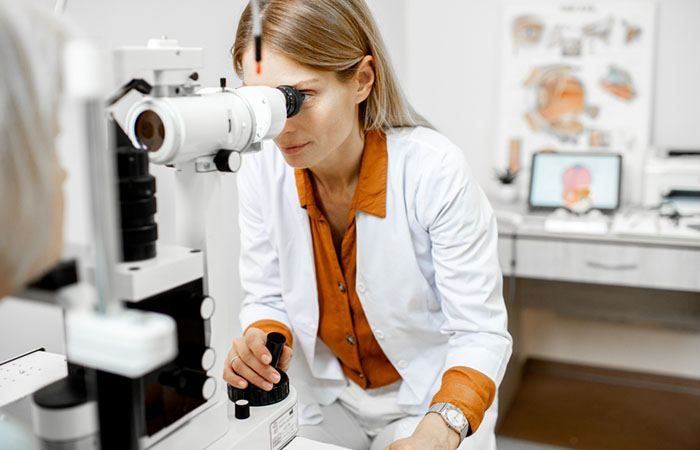 An eye surgeon checking before eyeball piercing