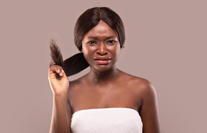 Woman with dry hair and split ends