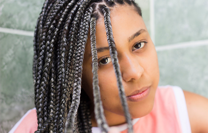 Woman with gray box braids