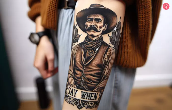 A woman with a Doc Holliday ‘Say When’ tattoo on the forearm
