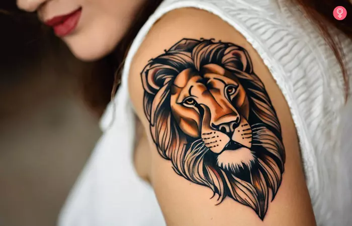 Lion tattoo on the upper arm