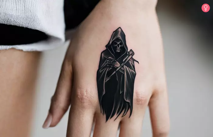 Grim Reaper hand tattoo