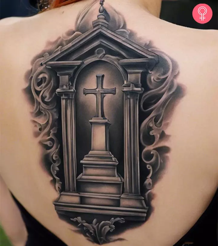 A woman sports a tombstone tattoo on her back