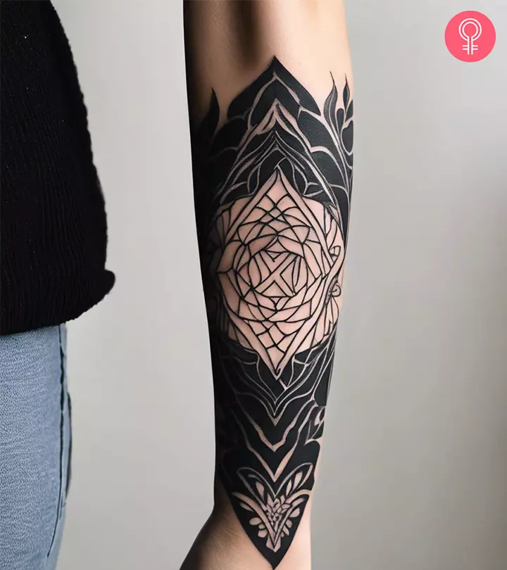 Blackout tattoo on the forearm