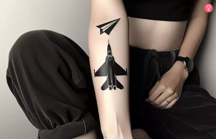 Paper airplane shadow tattoo