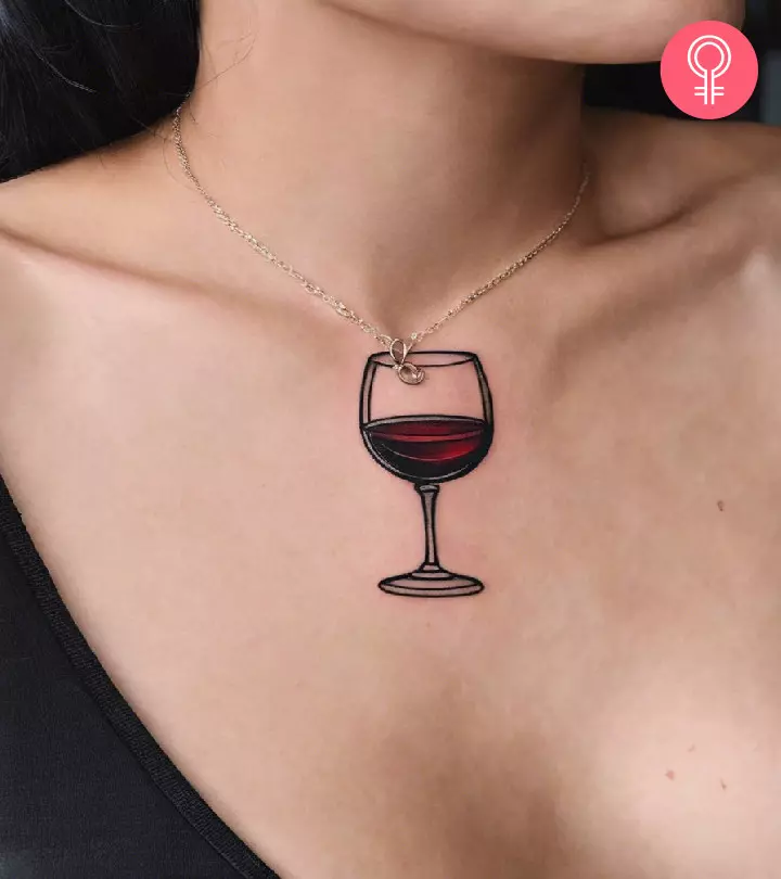 A woman with a wine glass tattoo inked on her chest