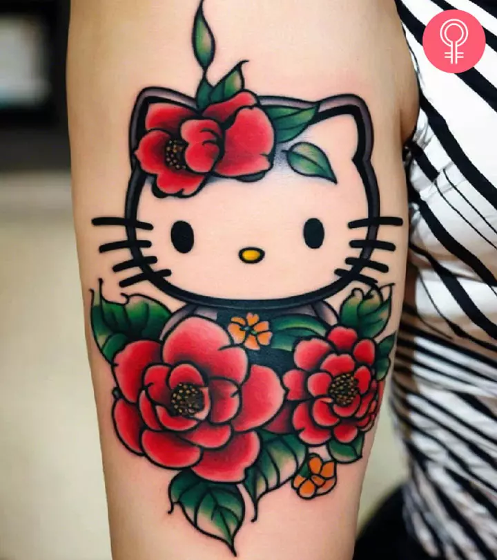 Woman with a Hello Kitty tattoo on her arm