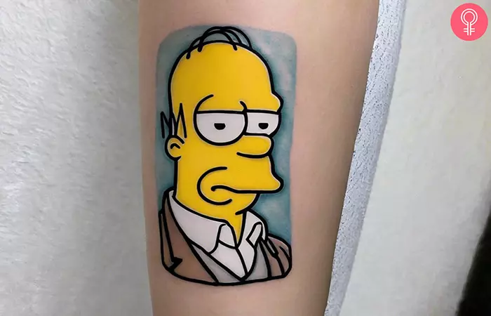 A Homer Simpon tattoo on a woman’s arm