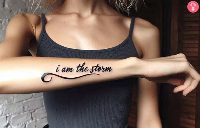 A “I am the storm” tattoo on the arm