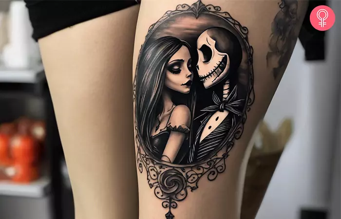 A black and gray leg Jack and Sally tattoo