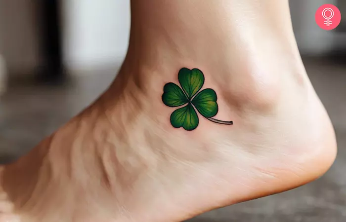 A four-leaf clover tattoo on the ankle
