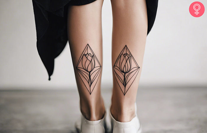 A geometric tulip tattoo on the leg