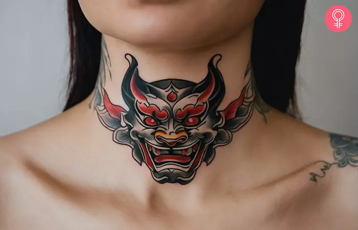 A hannya mask throat tattoo