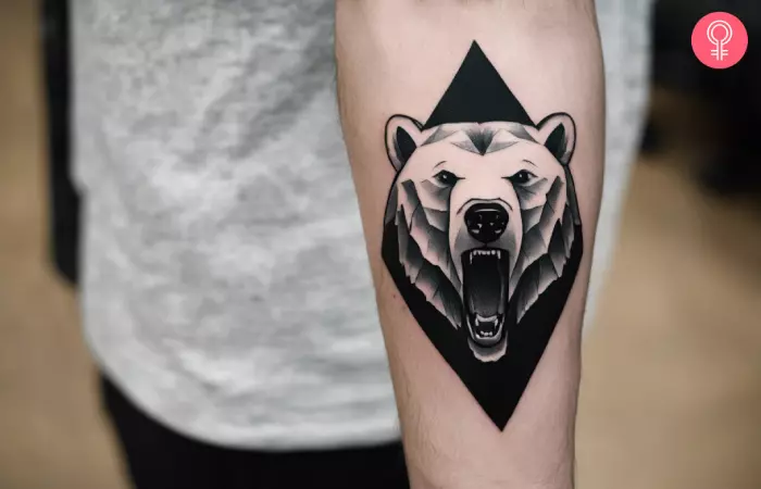 A man sports an angry polar bear tattoo