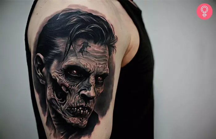 A man with a black zombie tattoo on his upper arm