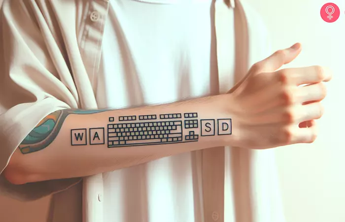 A man with a keyboard tattoo on his upper arm