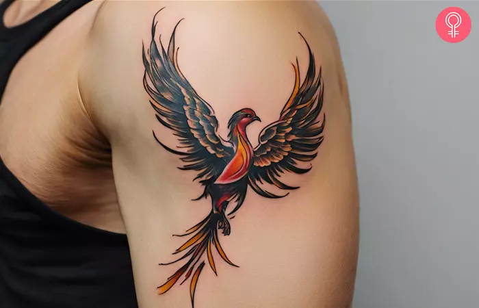 A man with a phoenix tattoo on his arm