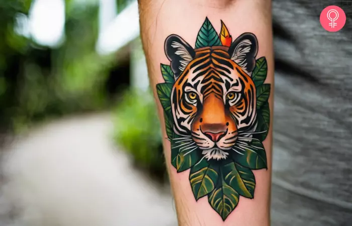 A man with a tiger tattoo on the forearm