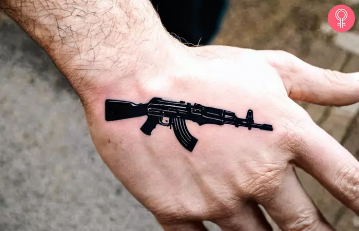 A man with an AK-47 tattoo on his hand