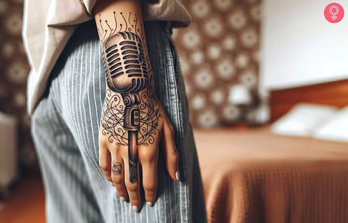 A microphone hand tattoo