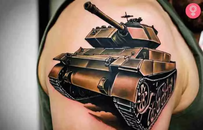 A military tank tattoo on the outer arm of a man