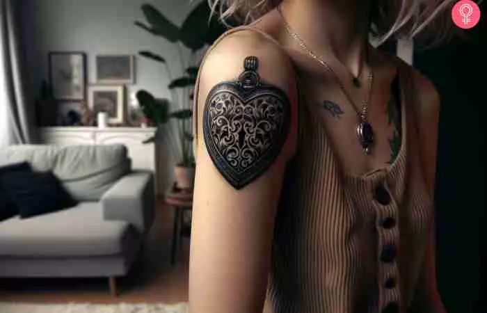 A modern classic heart locket tattoo