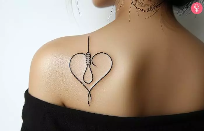 A noose heart tattoo