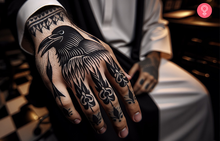 A raven bird tattoo on the hand