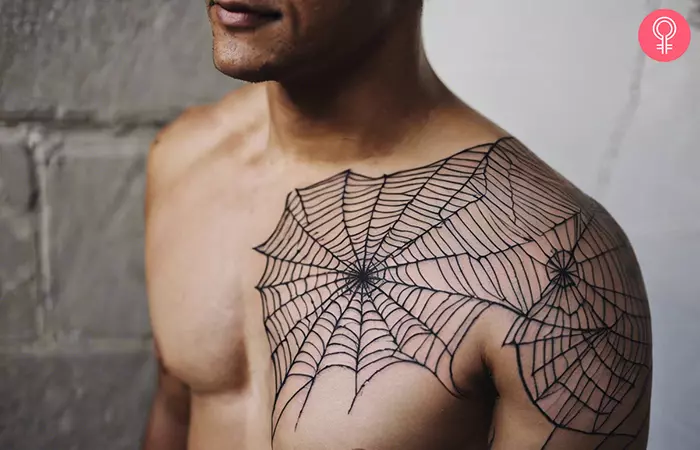 A spider web tattoo on the shoulder
