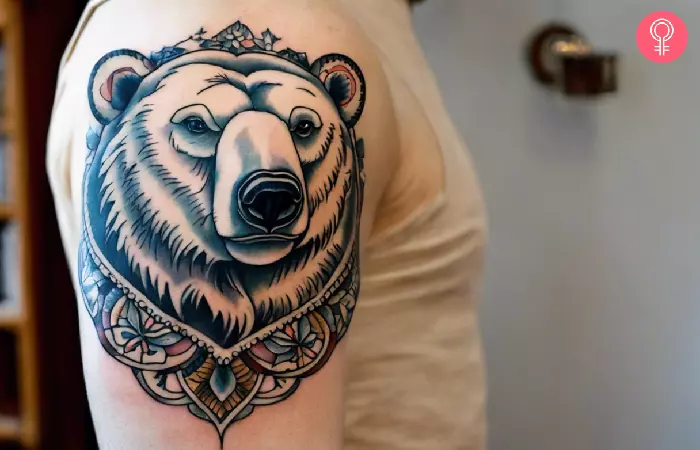 A traditional polar bear tattoo on the upper arm