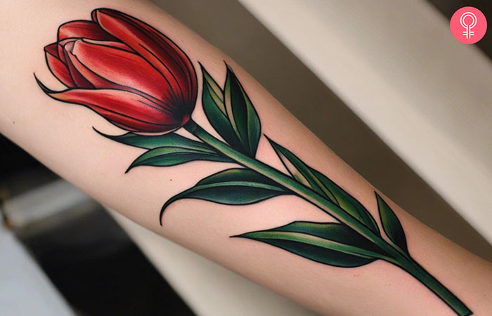 A traditional tulip tattoo on the forearm