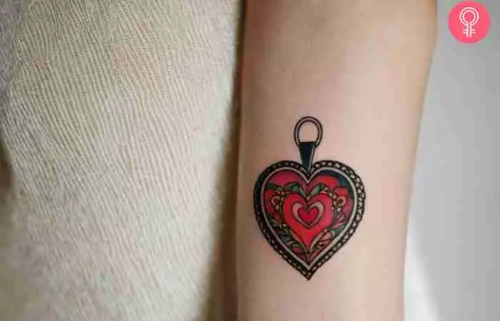 A trendy design for a heart locket tattoo