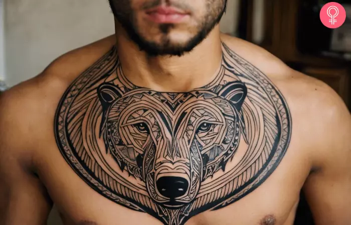 A tribal polar bear tattoo on the chest