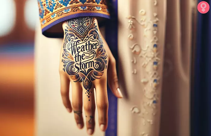 A “weather the storm” tattoo on the hand